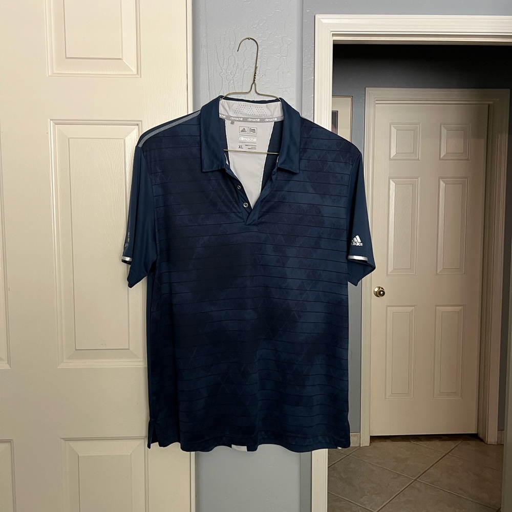 Adidas Men's Navy Polo with Subtle Patterns